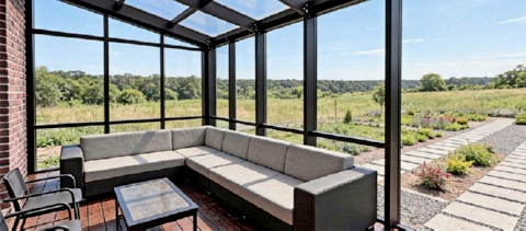 Sunroom With A Wooden Floor.jpg